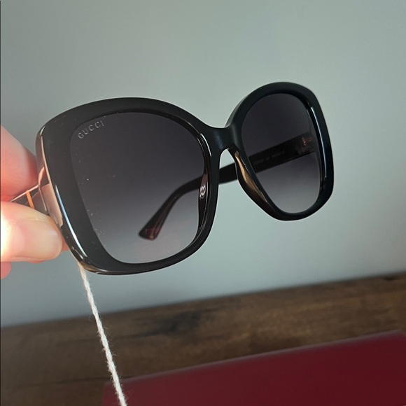 Gucci Women's Black Sunglasses with Gold Accents - Picture 2 of 10